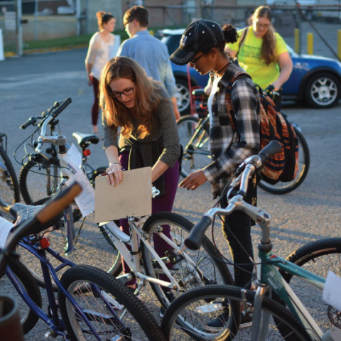 Two People with Bikes