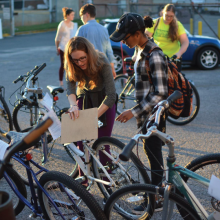 Two People with Bikes