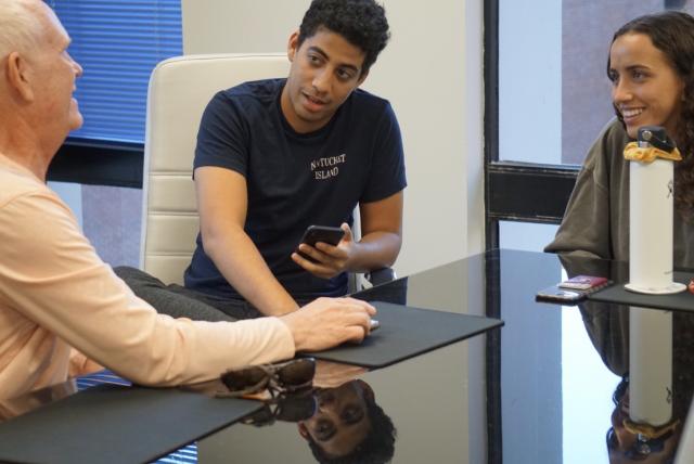 students discuss research topics with members of Sustainable Tallahassee