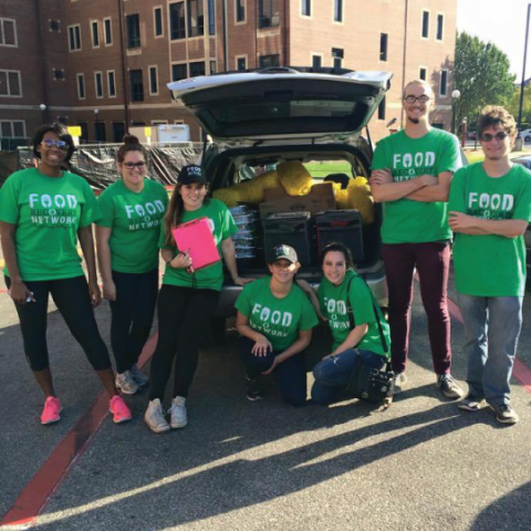 Food Recovery Network Students Next to Car with Donated Food