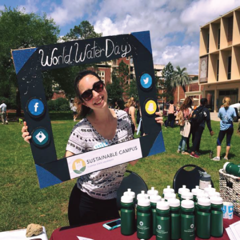 Girl Holding World Water Day Frame with Bottles