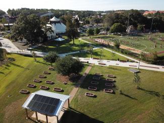 Bird's eye view of sustainability hub solar panels and garden beds